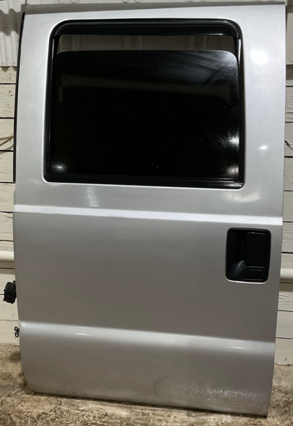 2011-2016 Ford F-250-F-550 Super Duty Rear Driver Door Color: UX(Ingot Silver Metallic)USED OEM